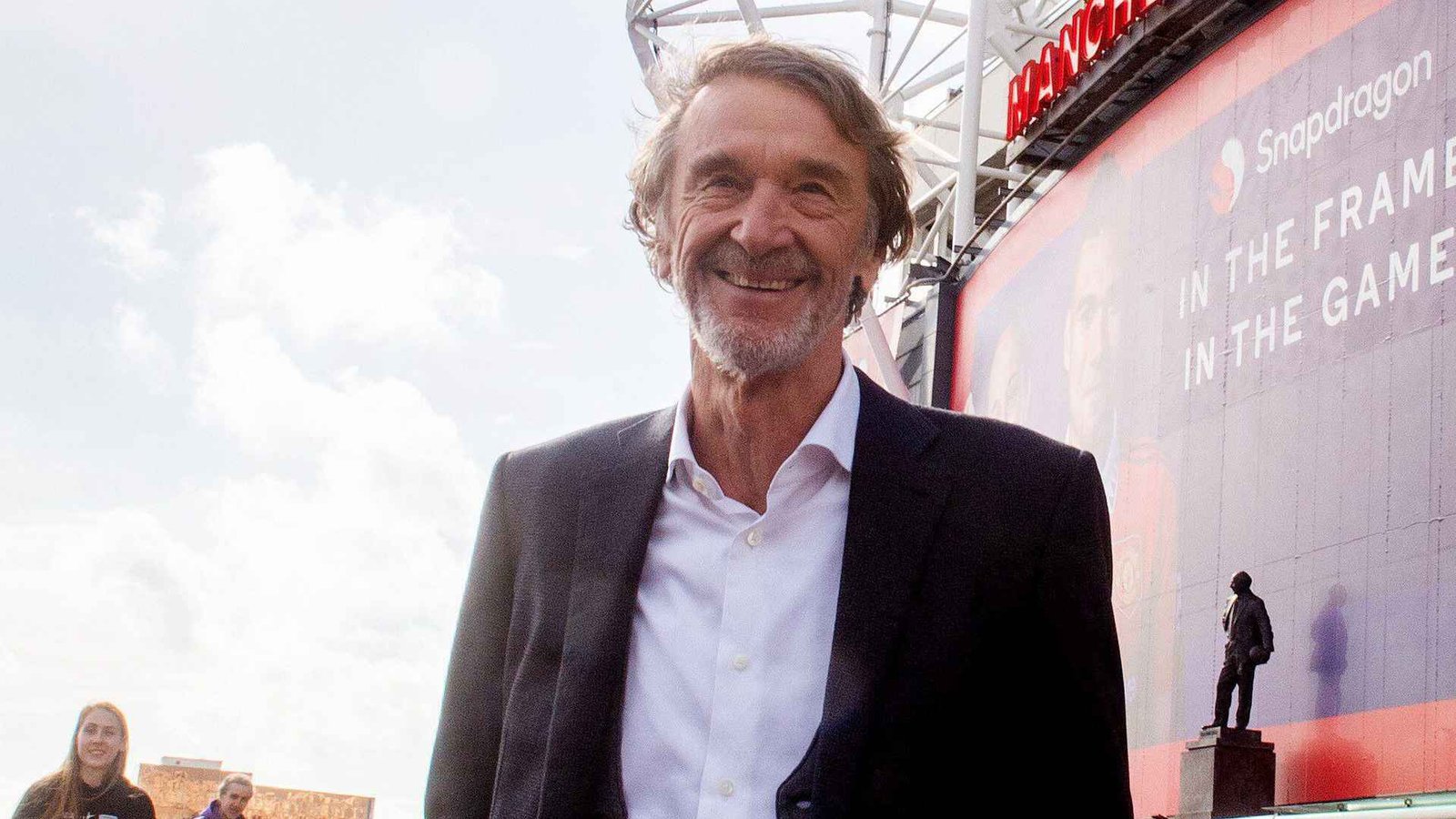 Sir Jim Ratcliffe standing outside Old Trafford