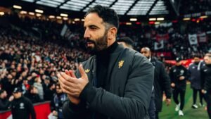 Ruben Amorim applauding Manchester United fans at Old Trafford