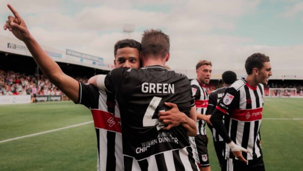 Grimsby Town players celebrating a goal