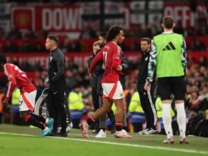 Kobbie Mainoo entering the pitch for Joshua Zirkzee while Ruben Amorim watches on in Manchester United game against Newcastle