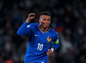 Kylian Mbappe celebrating after scoring for France