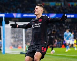 Alex Grimaldo celebrate goal for Bayer Leverkusen against Manchester City