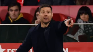 Real Madrid coach Xabi Alonso directing his players from the sideline