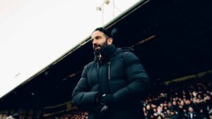 Manchester United manager Ruben Amorim emerging from the dugout