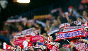 Atletico Madrid fans raising banners during a match