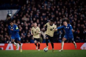 Barcelona and Chelsea players vying for the ball at Stamford Bridge