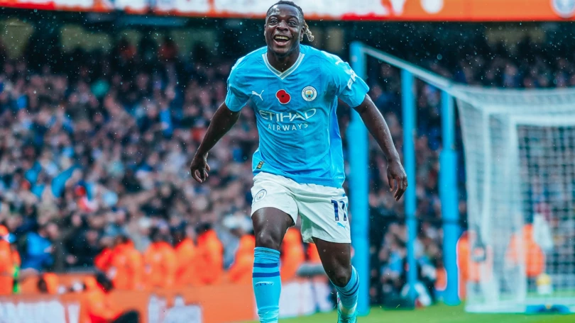 Manchester City's Jeremy Doku celebrating a goal against Liverpool