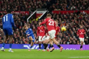 Kiernan Dewsbury-Hall scoring for Everton against Manchester United