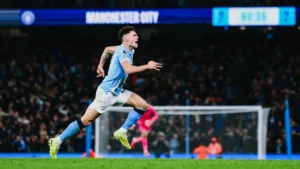Phil Foden celebrating after scoring for Manchester City against Leeds
