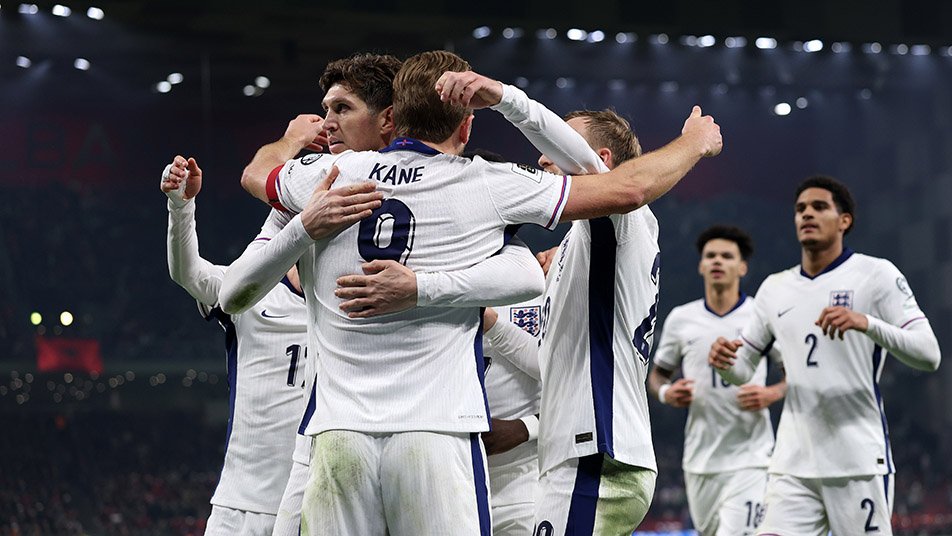 Harry Kane of England celebrates scoring his team's first goal with teammates during the FIFA World Cup 2026 qualifier match between Albania and England at Air Albania Stadium on November 16, 2025 in Tirana, Albania.