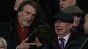 Sir Jim Ratcliffe in conversation with Sir Alex Ferguson at Old Trafford