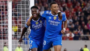 Kylian Mbappe and Vinicius Junior celebrating a goal for Real Madrid