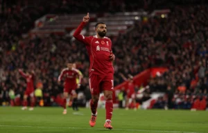 Mohamed Salah celebrates goal for Liverpool at Anfield