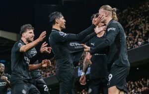 Erling Haaland and Manchester City teammates celebrating goal agaisnt Fulham
