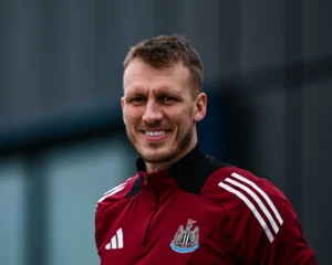 Newcastle defender Dan Burn posing for a photo on the training ground