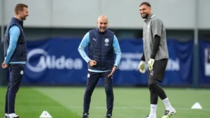 Pep Guardiola and Gianluigi Donnarumma in training
