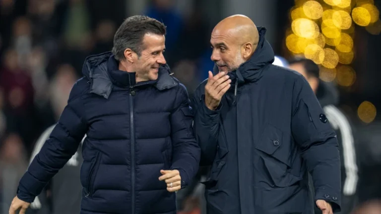 Pep Guardiola in conversation with Fulham boss Marco Silva
