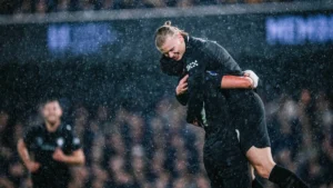 Erling Haaland celebrating his 100th Premier League goal