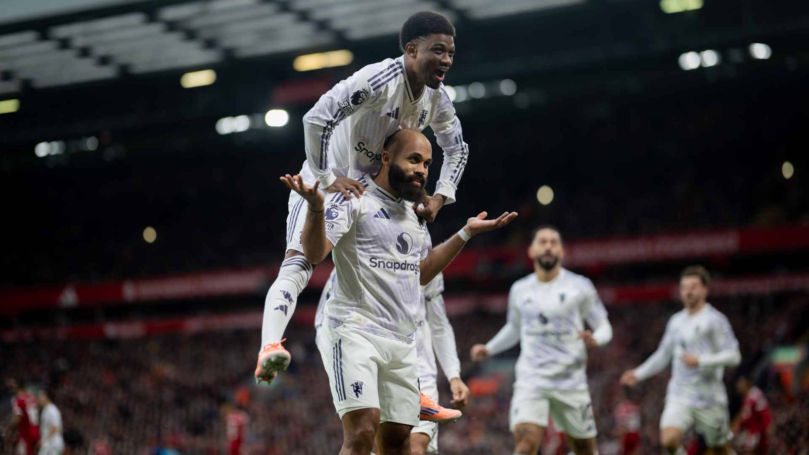 Bryan Mbeumo and Amad Diallo celebrating a goal for Manchester United