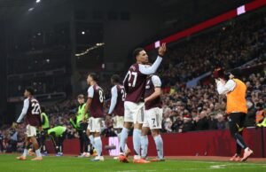 Morgan Rogers celebrating with Aston Villa teammates after scoring a goal