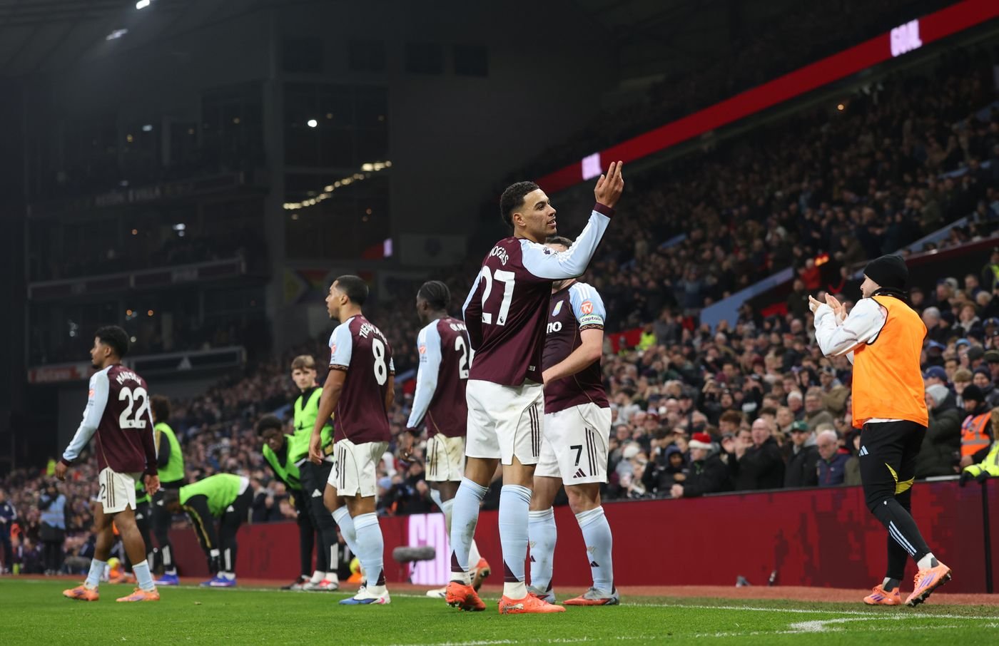Morgan Rogers celebrating with Aston Villa teammates after scoring a goal