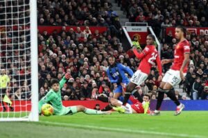 Bournemouth forward Antoine Semenyo scoring a goal against Manchester United