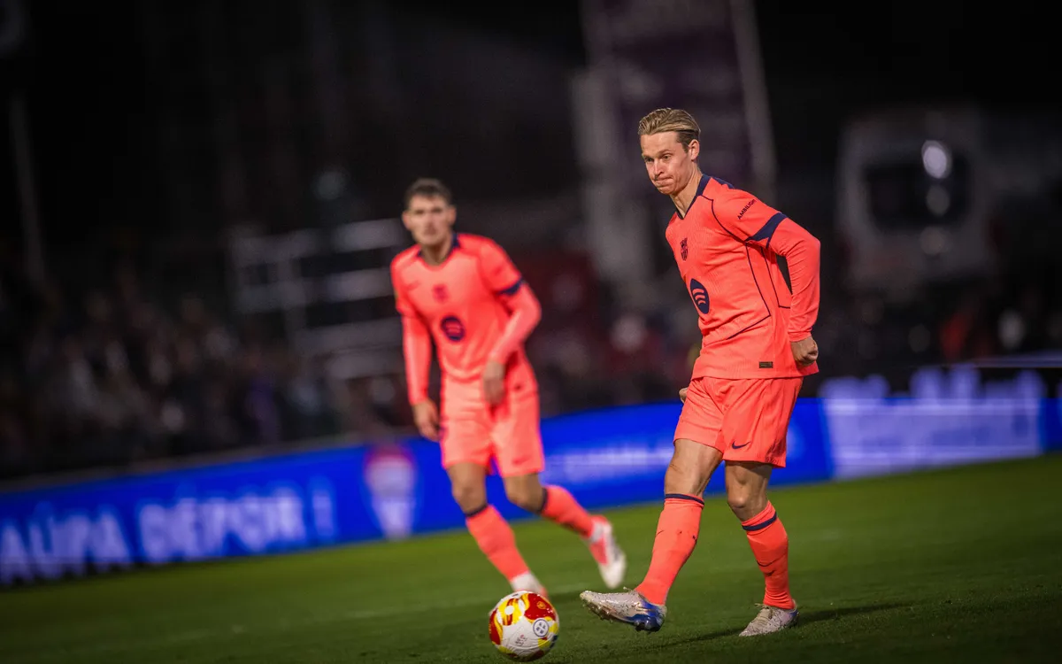 Barcelona captain Frenkie de Jong passing the ball on the pitch