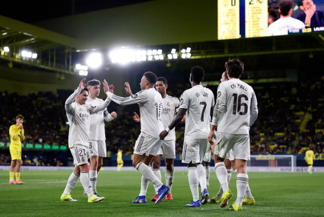 Kylian Mbappe celebrating with teammates