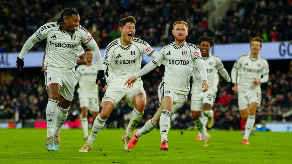 Harrison Reed celebrating late equaliser for Fulham against Liverpool