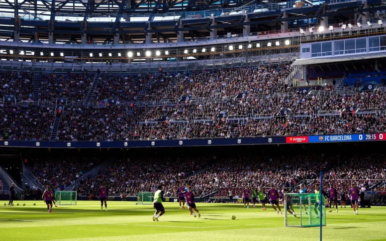 Barcelona players training in front of fans at the Spotify Camp Nou