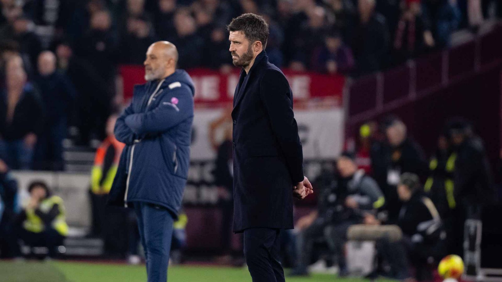 Michael Carrick on the touchline alongside Nuno Espirito Santo