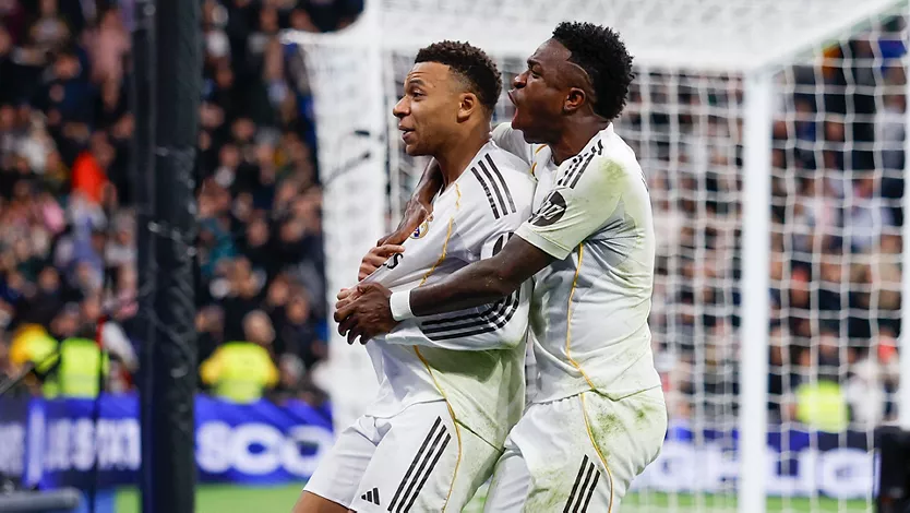 Kylian Mbappe and Vinicius Junior celebating Real Madrid's goal
