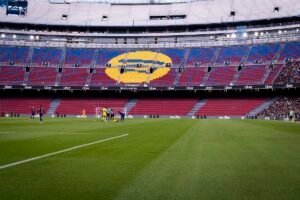 Barcelona players standing on the pitch during match at the Spotify Camp Nou