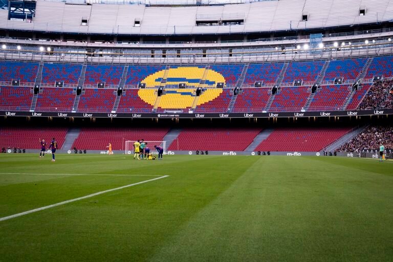 Barcelona players standing on the pitch during match at the Spotify Camp Nou