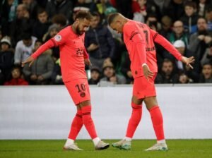 Kylian Mbappe and Neymar celebrating a goal for PSG
