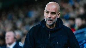 Pep Guardiola looking on as Manchester City face Nottingham Forest