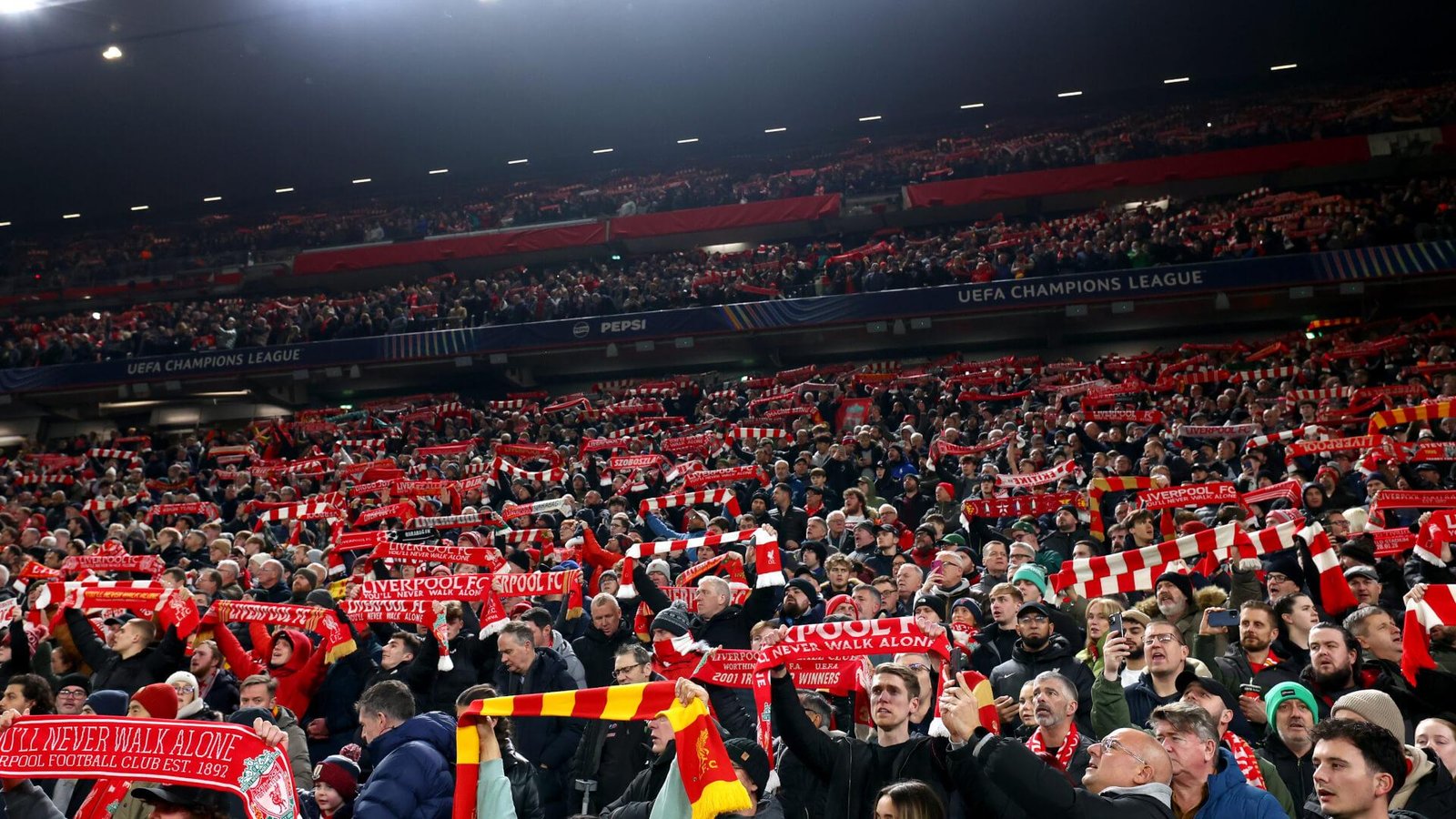 Liverpool fans displaying banners at Anfield