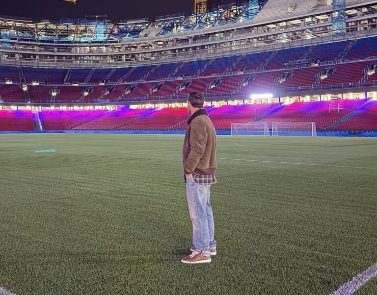 Lionel Messi standing at Camp Nou