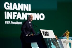 Fifa president Gianni Infantino giving a speech at a podium