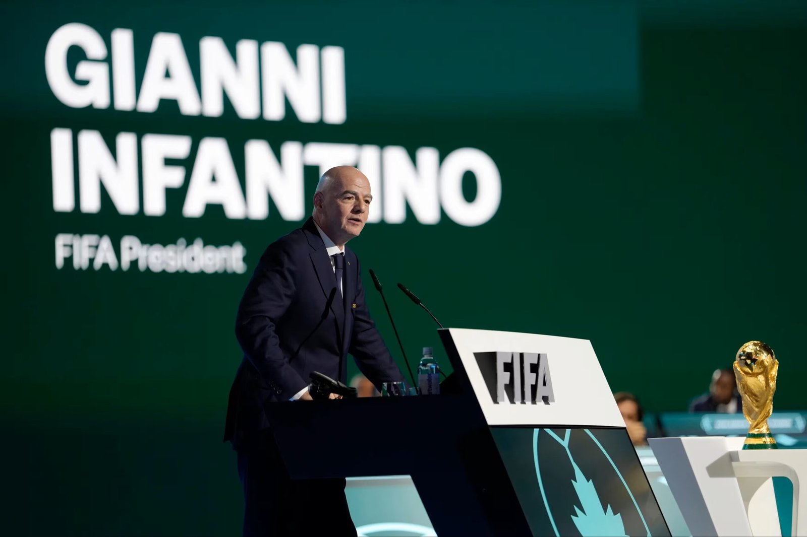 Fifa president Gianni Infantino giving a speech at a podium