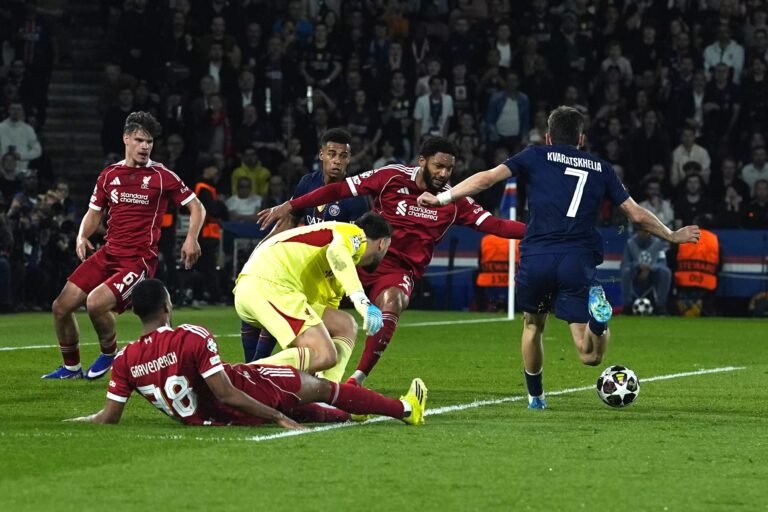 Paris Saint-Germain's Khvicha Kvaratskhelia about to score a goal against Liverpool in the Champions League