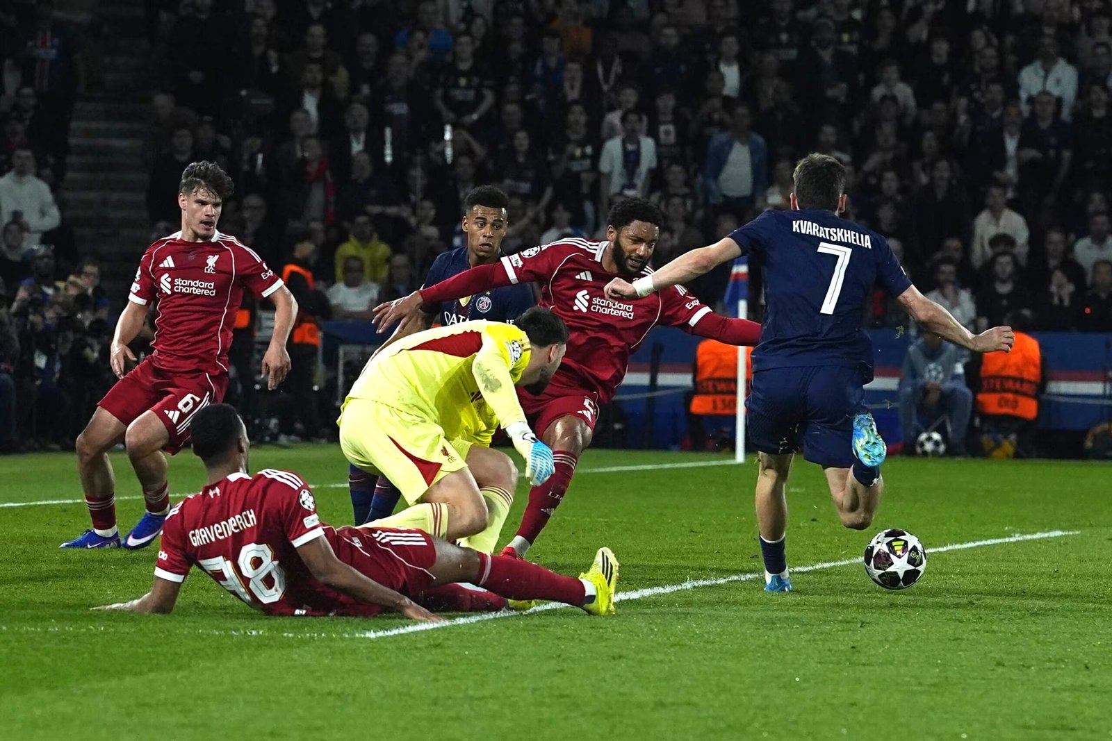 Paris Saint-Germain's Khvicha Kvaratskhelia about to score a goal against Liverpool in the Champions League