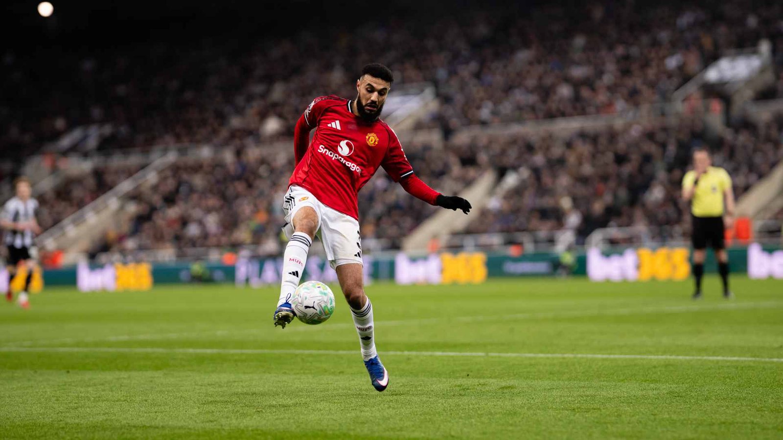 Mazaroui in action for Manchester United