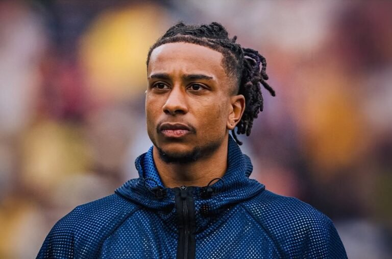 Michael Olise standing on the pitch ahead of a France game