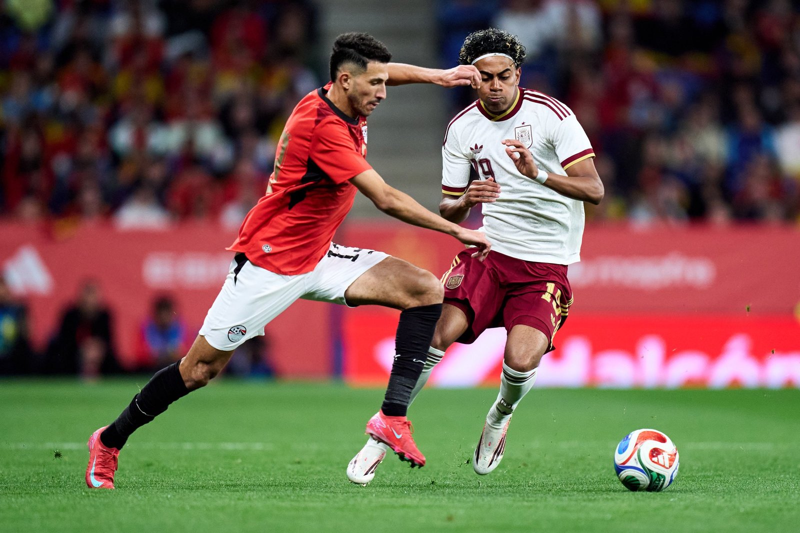 Lamine Yamal vying for the ball in a friendly against Egypt