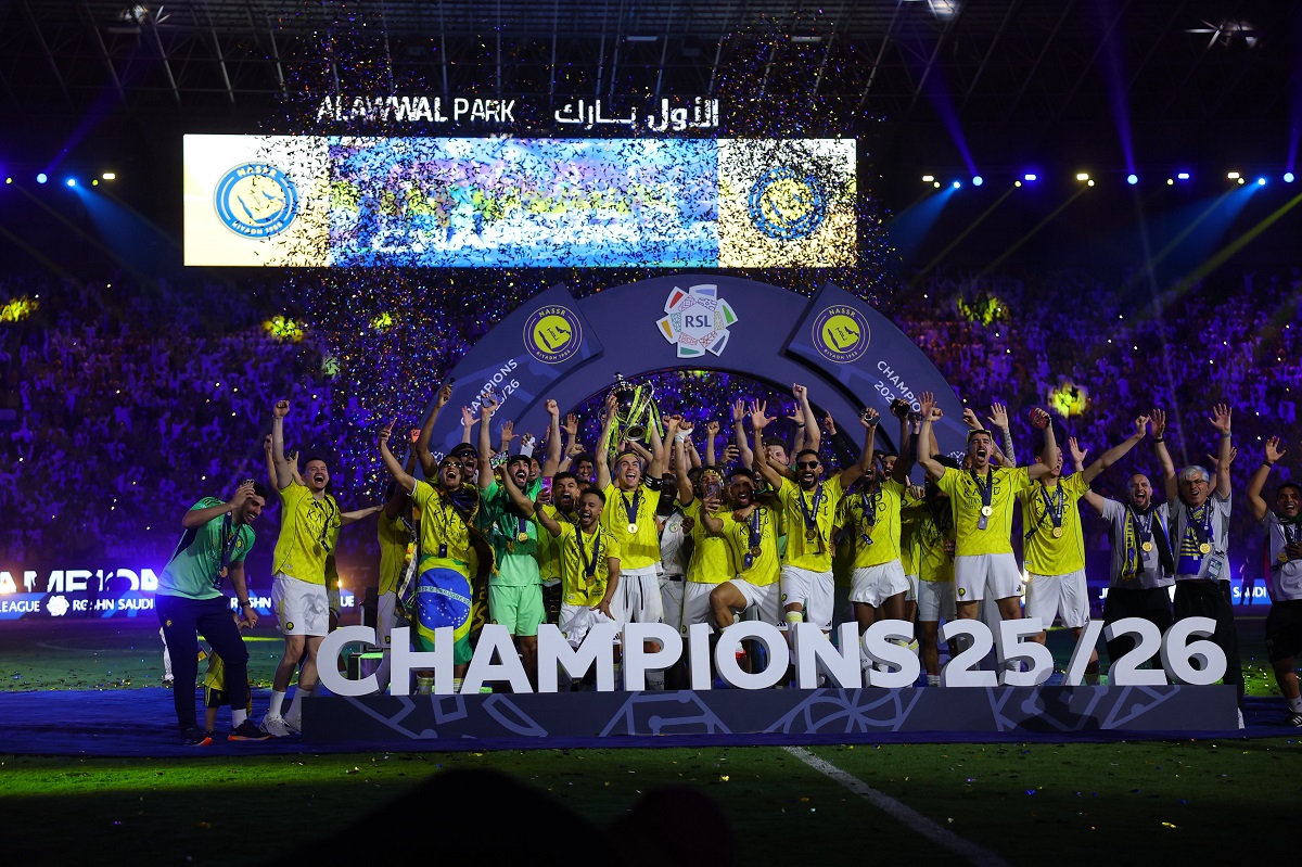 Cristiano Ronaldo and Al-Nassr player celebrating title win