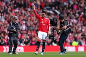 Casemiri waving goodbye to Manchester United fans in final home game against Nottingham Forest