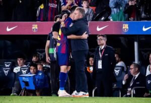 Hansi Flick hugging Robert Lewandowski at Camp Nou