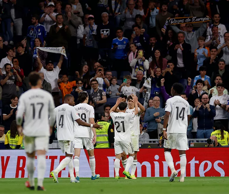 Real Madrid players celebrating at the Bernabeu