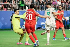 Algeria's Amine Gouiri scores his side's second to ensure comeback win over Jordan